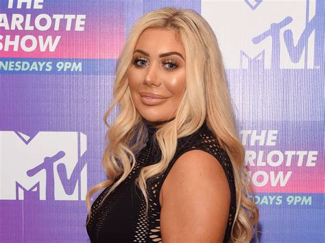 Chloe Ferry hits the beach in impossibly tiny bikini that barely .